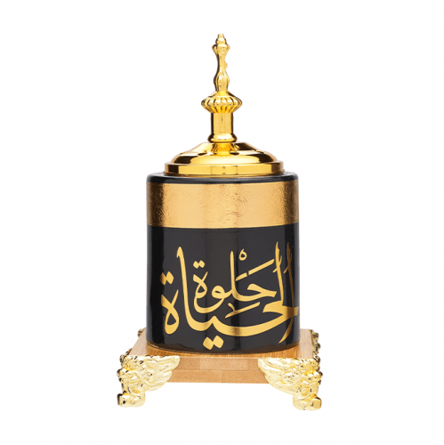 

مبخرة دائرية لون اسود بعبارة الحياة حلوة بلون ذهبي وقاعدة خشبية من تراد - صغير